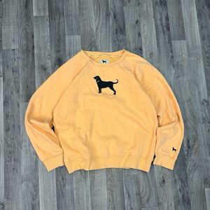The black dog orange crewneck sweatshirt